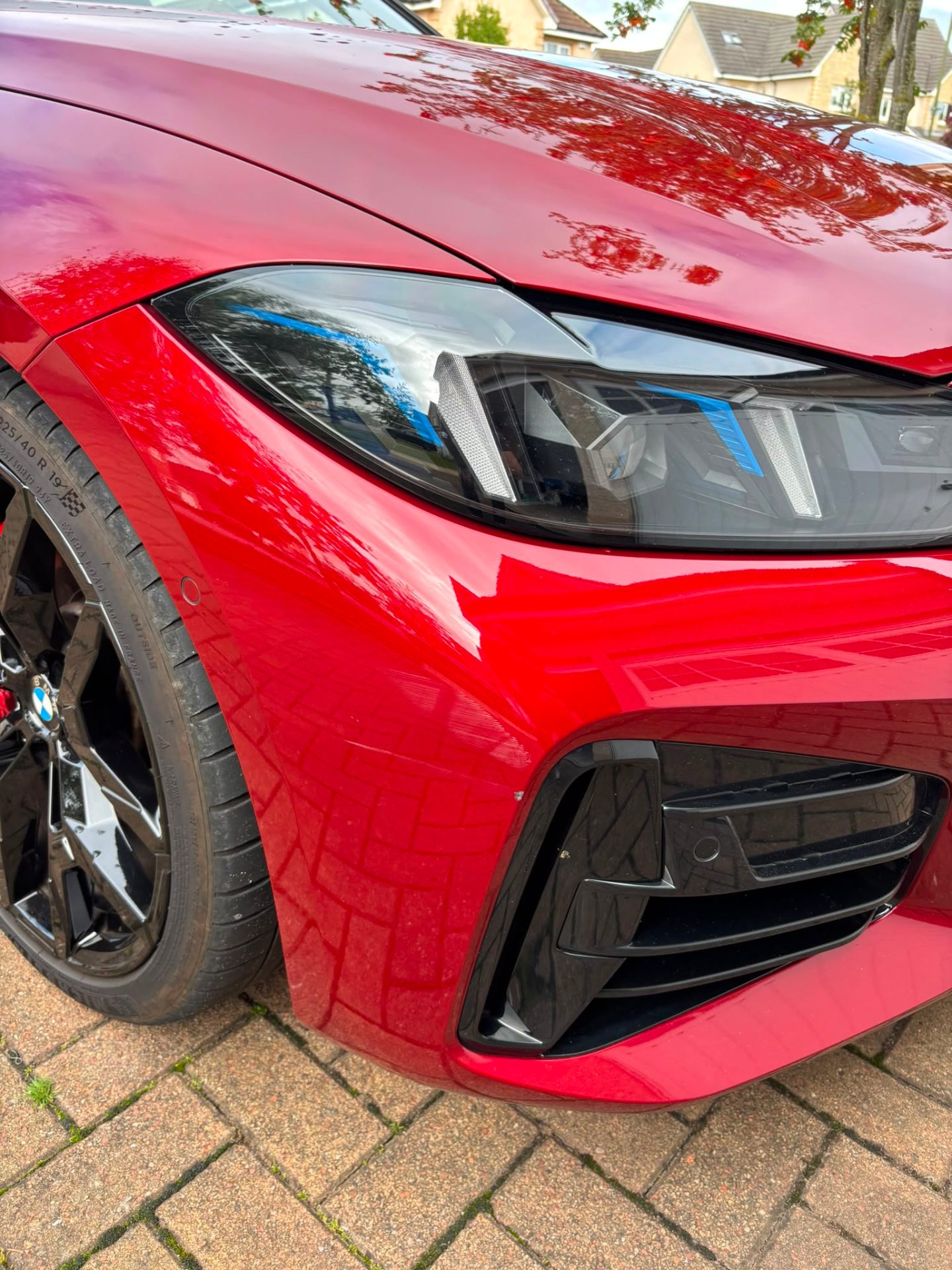 BMW red front wing paint repair blended seamlessly into original panel