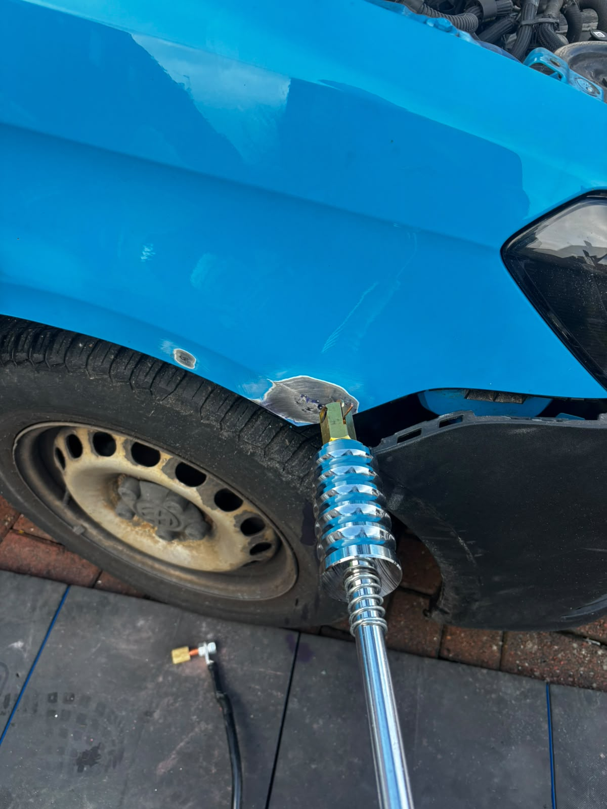 Before, Scottish Gas Volkswagen Caddy, dented front wing pulled, filled and repainted